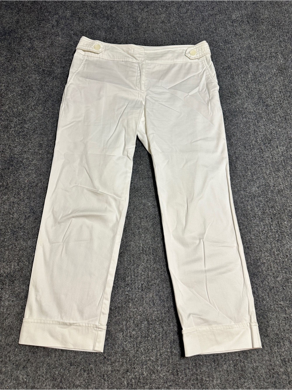 Dalia Collection white cropped capri pants, featuring a classic flat front